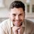 close-up-smiley-man-posing-scaled.jpg